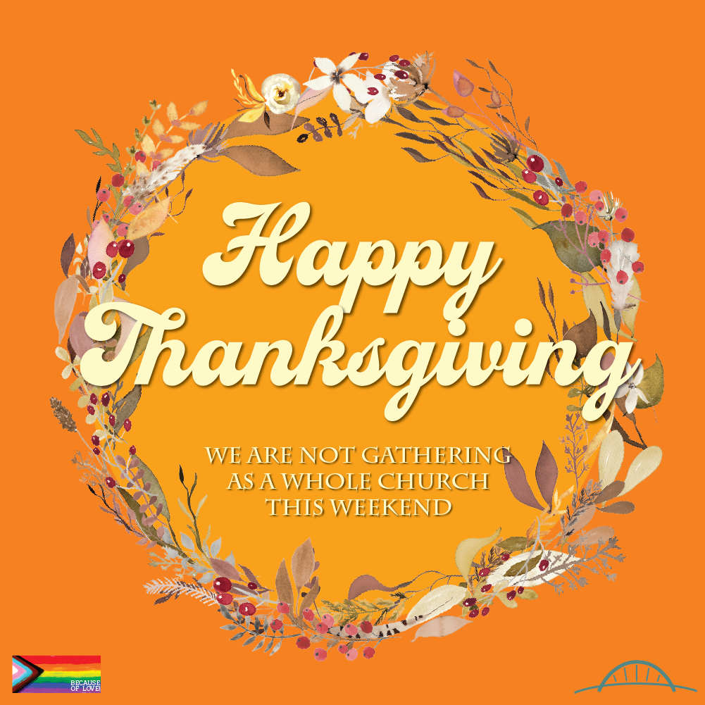 Two tone orange background with a fall wreath with words Happy Thanksgiving