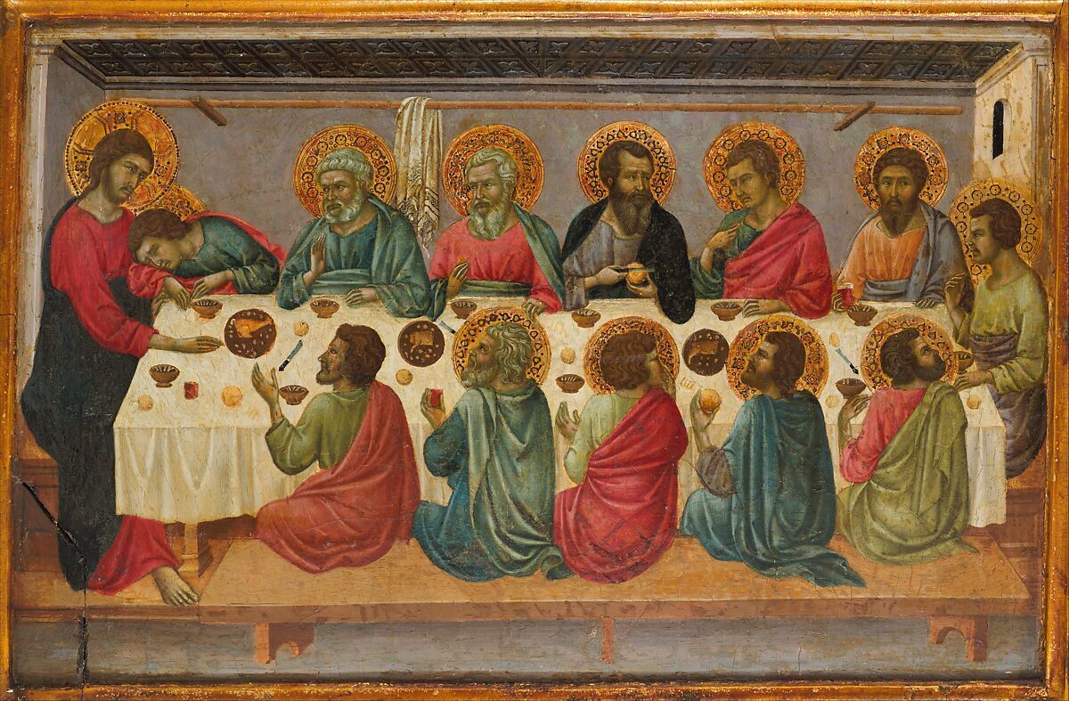 Jesus and the 12 sit around the table of the last supper